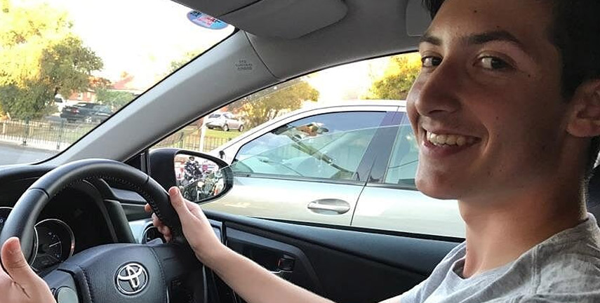 Happy student learning to drive with Betty
